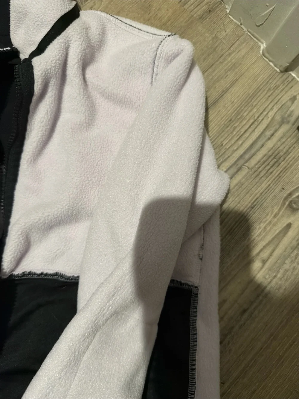 The North Face Kids Light Pink and Black Fleece Jacket